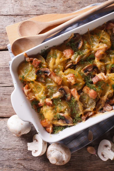 Baked potatoes with bacon close up. vertical top view — Stock Photo, Image