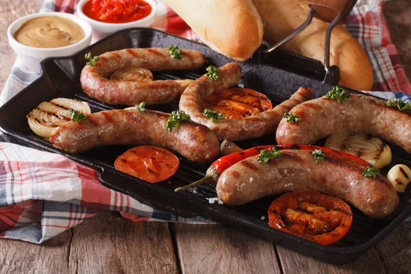 Sausage with grilled vegetables and buns, sauce. horizontal — Stock Photo, Image
