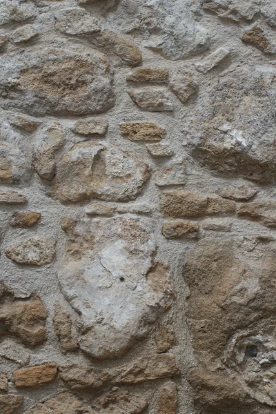 Sample of old stonework wall close-up. vertical — Stock Photo, Image