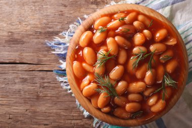 beans in tomato sauce with dill horizontal top view clipart