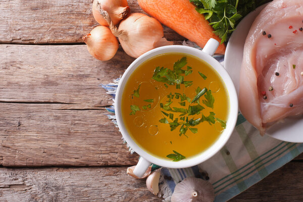 Country Food: chicken soup and ingredients top view