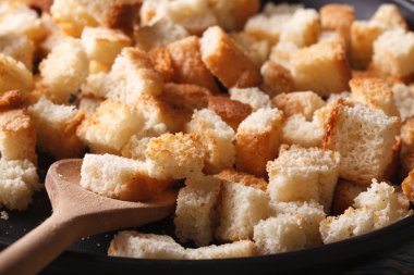 Homemade crunches in a pan macro. Horizontal  clipart