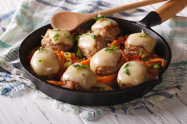 Meat balls baked with cheese and vegetables in the pan. — Stock Photo, Image