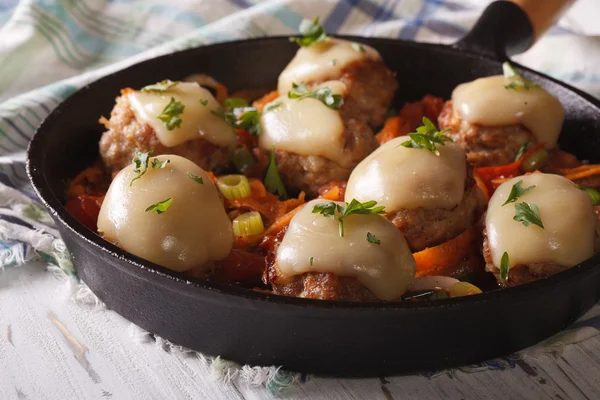 Meatballs baked with mozzarella close-up in a pan. Horizontal — Stock Photo, Image