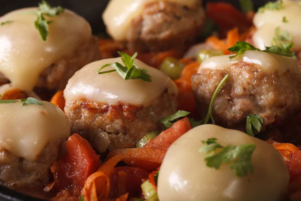 Meatballs baked with mozzarella closeup. horizontal — Stock Photo, Image