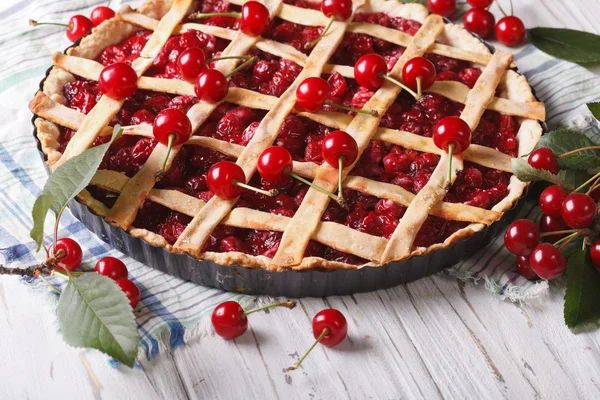 Cherry pie and ripe berries on the table. Horizontal — Stock Photo, Image