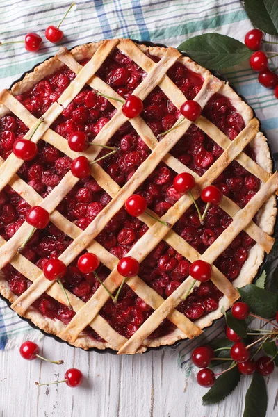 American homemade cherry pie close up. vertical top view — Stock Photo, Image