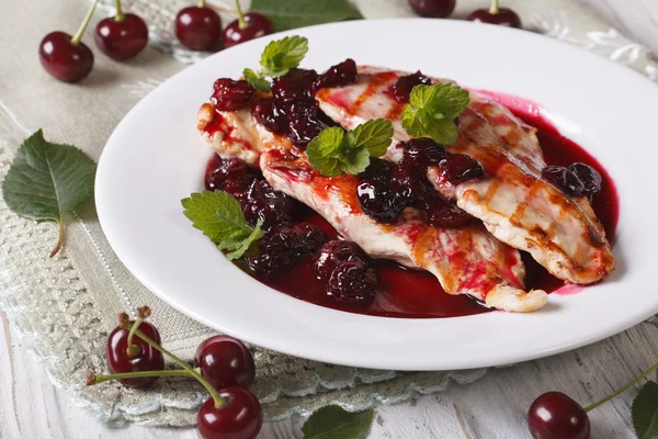 Grilled chicken with cherry sauce and mint close up. Horizontal — Stock Photo, Image