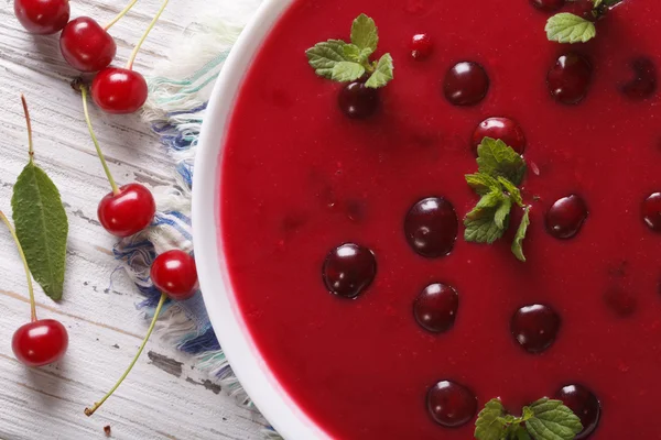 Delicious cold cherry soup in a bowl macro. Horizontal top view — Stockfoto