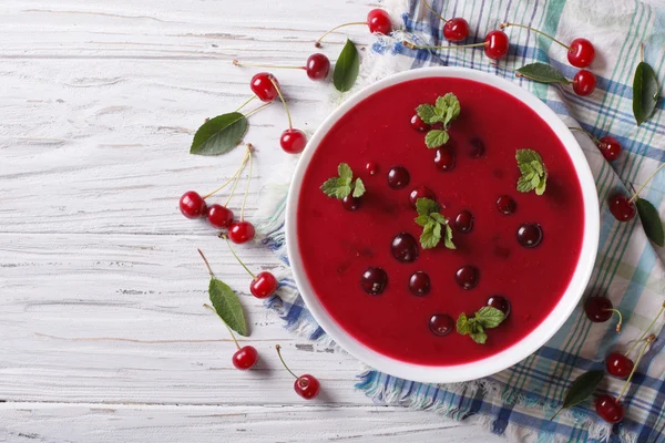 Hungarian cold cherry soup on the table. Horizontal top view — Stock Image Hungarian cold cherry soup on the table. Horizontal top view Stock Image