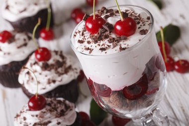 Black forest cherry dessert in a glass macro. horizontal clipart