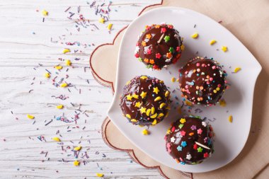 Fresh apples in chocolate close up. horizontal view from above
