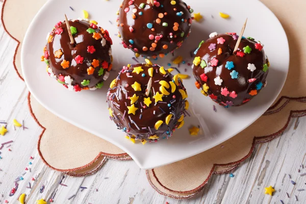 Apples in chocolate with candy sprinkles horizontal top view — Φωτογραφία Αρχείου