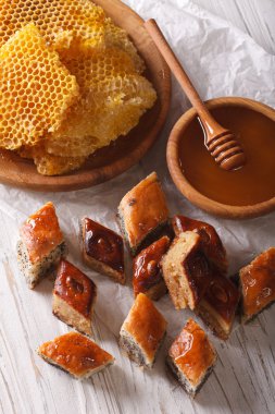 Oriental sweets: baklava close-up on a table, and a honeycomb. V
