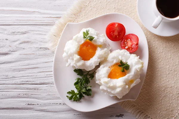 Breakfast aristocrat: eggs Orsini and coffee horizontal  top vie — Stock Photo, Image