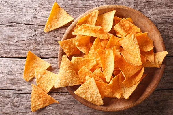 Nachos corn chips in the bowl. Horizontal top view — Stock Photo, Image