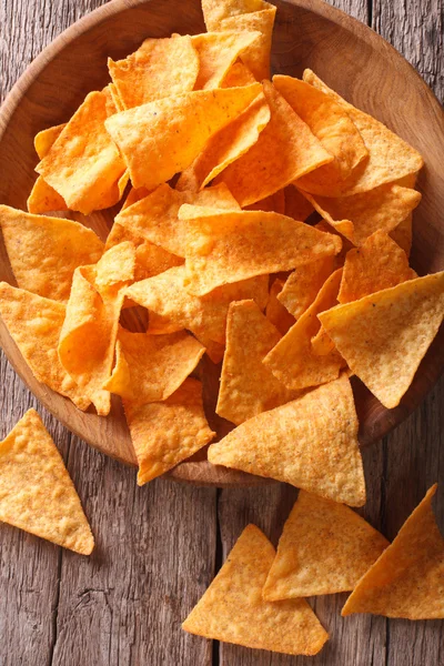 Nachos corn chips in the bowl close-up. vertical top view — Stock Photo, Image