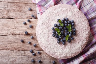 blueberry cheesecake with mint and coconut. horizontal top view