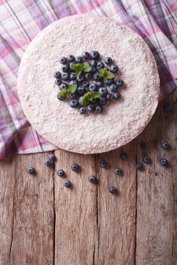 blueberry cheesecake with mint and coconut. vertical top view