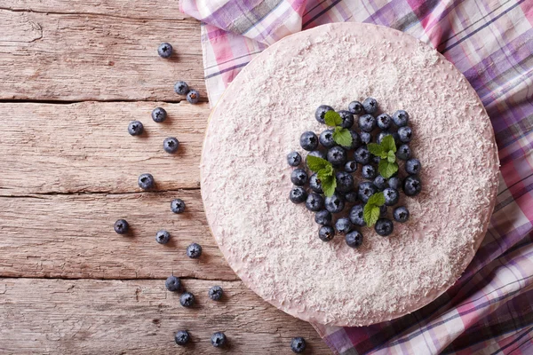 blueberry cheesecake with mint and coconut. horizontal top view