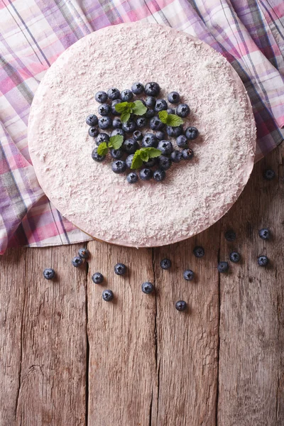 blueberry cheesecake with mint and coconut. vertical top view
