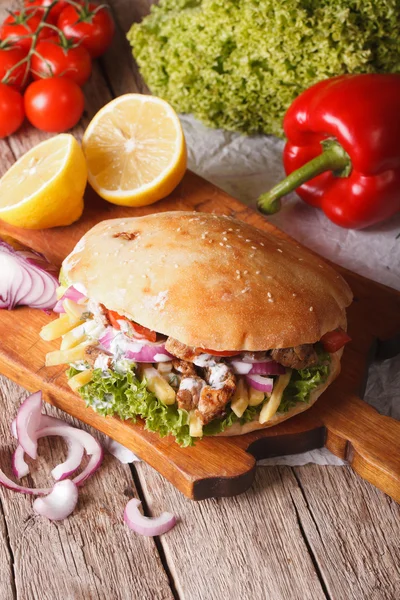 Doner kebab close-up on the table. vertical — Stock Photo, Image