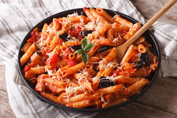 Penne with eggplant and tomatoes close-up. horizontal — Stock Photo, Image