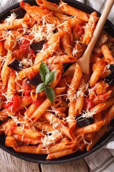 Pasta alla Norma. Penne with eggplant and tomatoes vertical — Stok fotoğraf