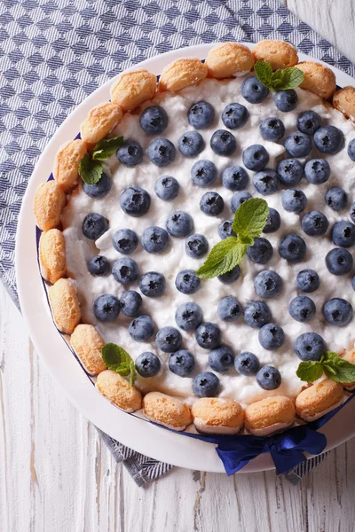 French blueberry cake charlotte close-up on a plate. vertical to — Stockfoto