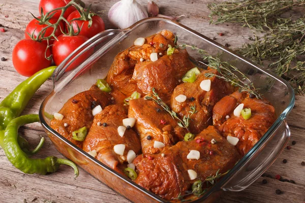 Raw meat beef marinated in a spicy red close-up. horizontal