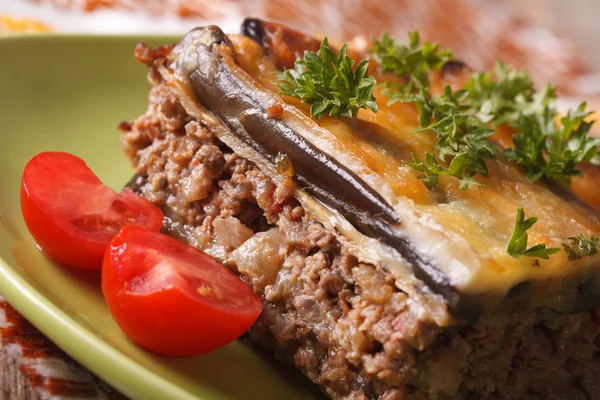 Serving traditional Greek moussaka on the plate macro. horizonta — ストック写真