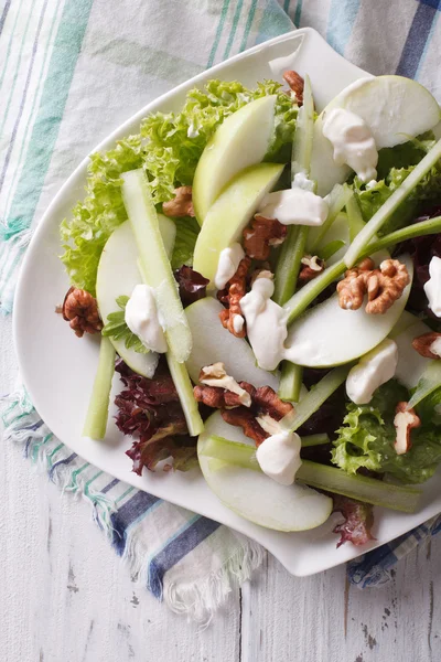 Waldorf Salad with apples, celery and walnuts close-up. vertical — 图库照片