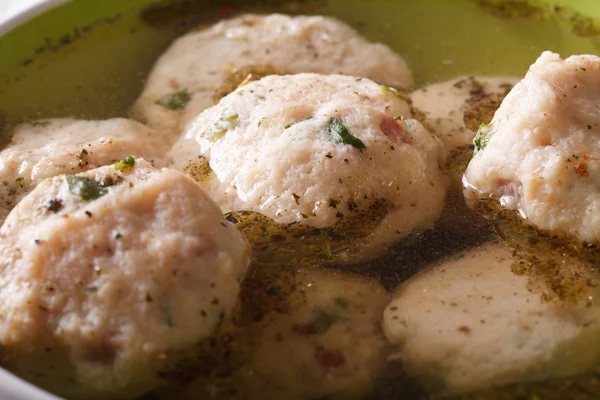 Delicious canederli in a broth close-up. horizontal — Stock Photo, Image