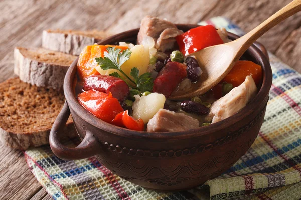Eintopf thick soup with meat and vegetables close-up. horizontal — Stock Image Eintopf thick soup with meat and vegetables close-up. horizontal Stock Photo
