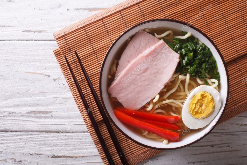 Asian Food: Ramen noodles with pork and egg. horizontal top view