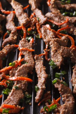 Korean cuisine: bulgogi of grilled macro. Vertical