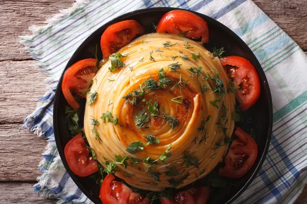 French timbale of pasta close-up on a plate. Horizontal top view — Stock Photo, Image