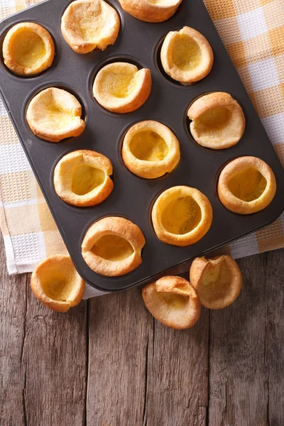 Yorkshire puddings in baking dish on the table. vertical top vie — ストック写真