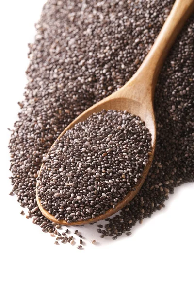 Chia seeds closeup in wooden spoon isolated on a white. vertical — Stockfoto