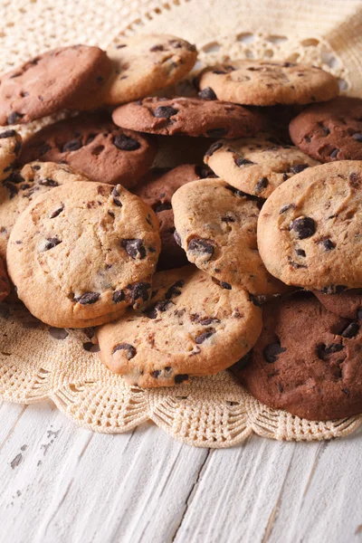 Pile of homemade chocolate chips cookies closeup, vertical Royalty Free Stock Images