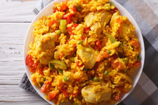 Rice with chicken and vegetables closeup. horizontal top view — 图库照片