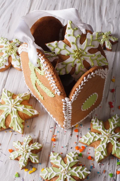 Gingerbread Christmas bag with snowflakes on a table. vertical — Stock Photo, Image
