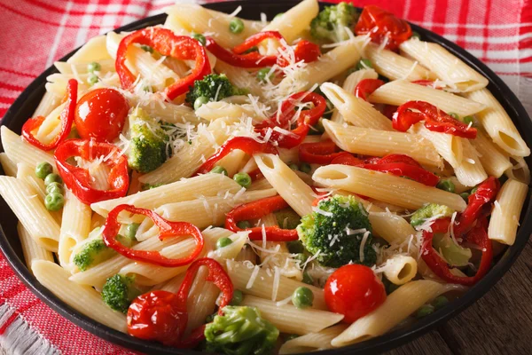 Pasta Primavera with vegetables close-up on a plate. horizontal — Stock Photo, Image