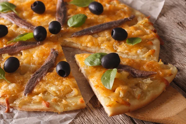 French pizza with anchovies and onions close-up. Horizontal — Stock Photo, Image