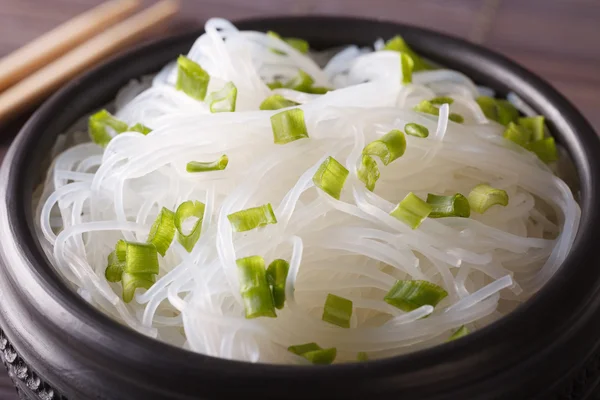 Bean thread noodles in a bowl closeup on the table. horizontal — Stock Photo, Image