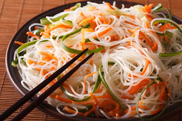 Bean thread noodles salad with cucumber and carrot close-up. — Stock Photo, Image