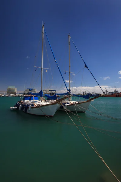 Two beautiful yachts moored in the port of Cyprus — Stock Photo, Image