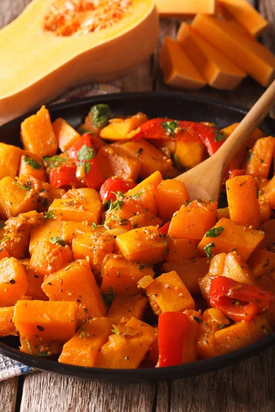 Pumpkin curry with herbs on a plate close-up. vertical — Stock Photo, Image