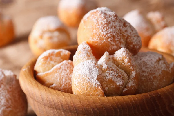 Delicious Italian donuts Castagnole macro in a bowl. horizontal — Stock Photo, Image