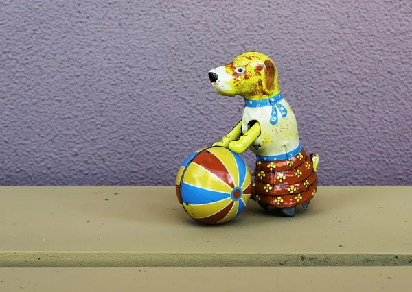 Vintage old metal toy with dog — Stock Photo, Image